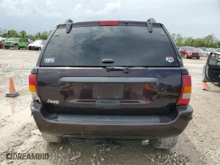 2004 Jeep Grand Cherokee Laredo with VIN 1J4GX48S44C150571, listed as a Copart auction lot 51013675 with 260,986 mi miles and Salvage Title. Bid and sale history available at carsss.com. Image 6.