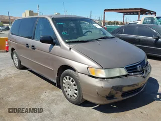 2003 Honda Odyssey LX with VIN 5FNRL18503B050469, listed as a IAAI auction lot 42854909 with 239,010 mi miles and . Bid and sale history available at DreamBid. Image 1.