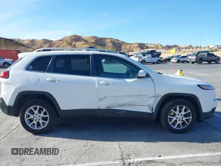 2016 Jeep Cherokee Latitude with VIN 1C4PJLCB9GW149217, listed as a IAAI auction lot 41365164 with 144,702 mi miles. Bid and sale history available at carsss.com. Image 13.