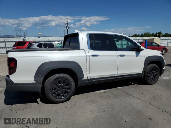2023 Honda Ridgeline RTL-E with VIN 5FPYK3F76PB011963, listed as a Copart auction lot 63079165 with 25,658 mi miles and Salvage title. Bid and sale history available at DreamBid. Image 3.