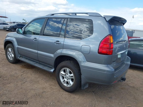 2004 Lexus GX 470 with VIN JTJBT20X540051909, listed as a IAAI auction lot 42083375 with 191,974 mi miles. Bid and sale history available at carsss.com. Image 3.