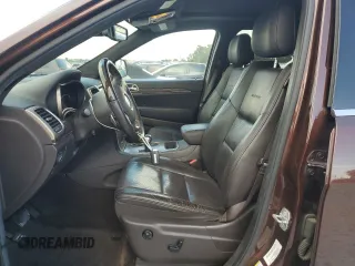 2014 Jeep Grand Cherokee Summit с VIN 1C4RJEJG4EC380074, выставлен на аукционе Copart как лот 64123175 с пробегом 237 803 миль миль и Списание • Salvage title. История ставок и продаж доступна на DreamBid. Изображение 7.