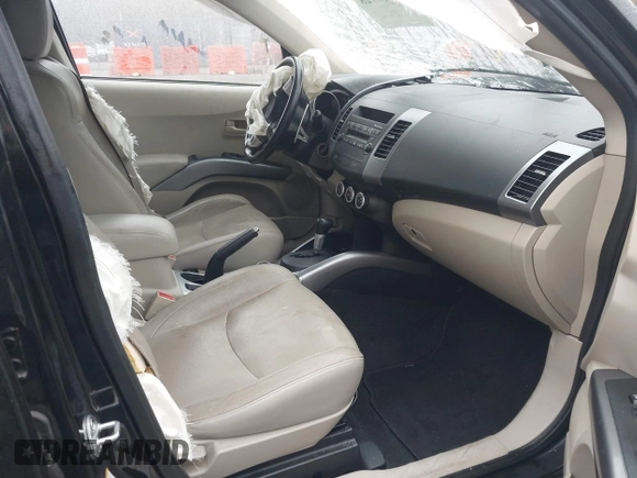2007 Mitsubishi Outlander XLS z VIN JA4MT41X97Z018573, wystawiony jako IAAI lot #41937728 z przebiegiem 151 346 mil mil oraz . Historia ofert i sprzedaży dostępna na DreamBid. Obrazek 5.