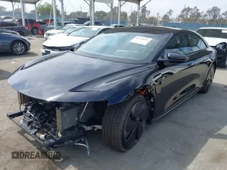 2024 Lucid Air Touring z VIN 50EA1TEAXRA005987, wystawiony jako IAAI lot #42294088 z przebiegiem Nie podano mil oraz . Historia ofert i sprzedaży dostępna na DreamBid. Obrazek 2.