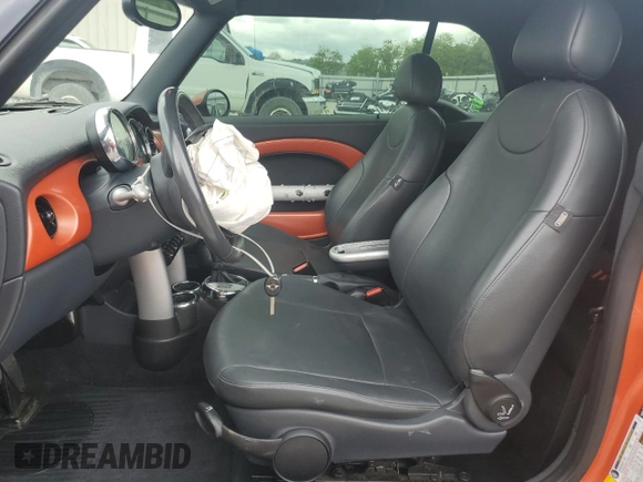 2006 MINI Convertible with VIN WMWRF335X6TG15824, listed as a Copart auction lot 56163205 with 113,109 mi miles and Salvage title. Bid and sale history available at DreamBid. Image 7.
