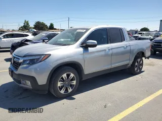 2017 Honda Ridgeline RTL-E with VIN 5FPYK3F78HB005129, listed as a Copart auction lot 64132195 with 30,431 mi miles and Salvage title. Bid and sale history available at DreamBid. Image 1.