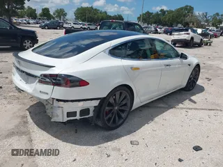 2017 Tesla Model S 100D with VIN 5YJSA1E45HF189006, listed as a IAAI auction lot 42540693 with 64,827 mi miles and . Bid and sale history available at DreamBid. Image 4.