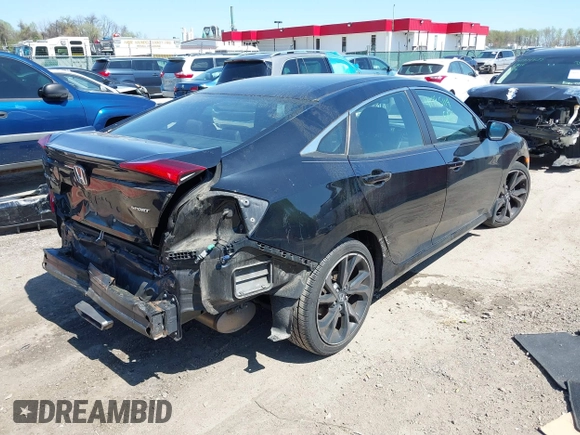 2019 Honda Civic Sport with VIN 2HGFC2F89KH569861, listed as a IAAI auction lot 41985114 with 104,880 mi miles and . Bid and sale history available at DreamBid. Image 4.