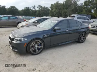 2016 BMW M5 with VIN WBSFV9C51GD595430, listed as a Copart auction lot 79675834 with 82,351 mi miles and Salvage Title. Bid and sale history available at carsss.com. Image 1.