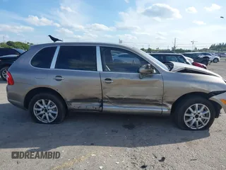2005 Porsche Cayenne S with VIN WP1AB29P75LA61263, listed as a IAAI auction lot 41635350 with 242,874 mi miles. Bid and sale history available at carsss.com. Image 14.