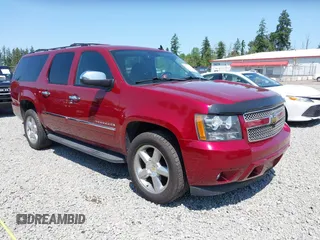 2011 Chevrolet Suburban z VIN 1GNSKHE37BR219368, wystawiony jako IAAI lot #42398016 z przebiegiem 180 308 mil mil oraz . Historia ofert i sprzedaży dostępna na DreamBid. Obrazek 1.