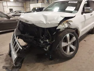 2016 Jeep Grand Cherokee Limited 75th Anniversary with VIN 1C4RJFBT9GC448406, listed as a IAAI auction lot 41521175 with 137,552 mi miles. Bid and sale history available at carsss.com. Image 6.