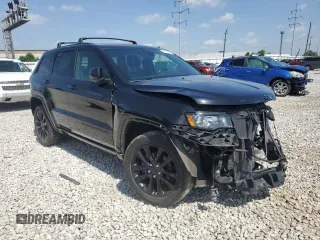 2020 Jeep Grand Cherokee Altitude with VIN 1C4RJFAG5LC267544, listed as a Copart auction lot 61273205 with 43,815 mi miles and Salvage title. Bid and sale history available at DreamBid. Image 4.