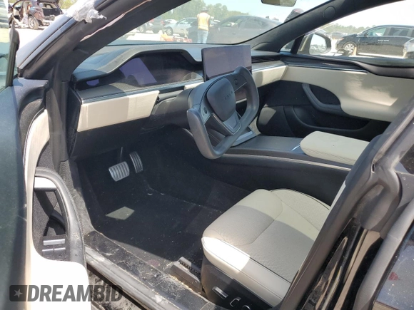 2023 Tesla Model S Plaid with VIN 5YJSA1E62PF511875, listed as a Copart auction lot 65583824 with Not provided miles and Salvage title. Bid and sale history available at DreamBid. Image 8.