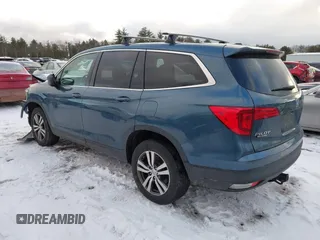 2018 Honda Pilot EX-L with VIN 5FNYF6H57JB007065, listed as a IAAI auction lot 41418432 with 123,806 mi miles. Bid and sale history available at carsss.com. Image 3.