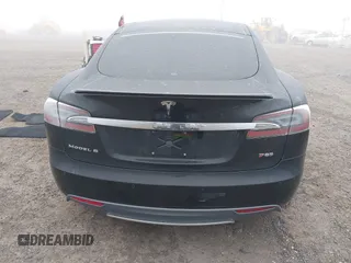 2014 Tesla Model S 60 with VIN 5YJSA1H1XEFP36008, listed as a IAAI auction lot 41287240 with 48,171 mi miles and . Bid and sale history available at DreamBid. Image 17.