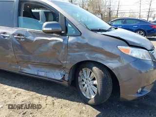 2013 Toyota Sienna XLE with VIN 5TDDK3DC0DS059036, listed as a IAAI auction lot 42069896 with 124,105 mi miles and . Bid and sale history available at DreamBid. Image 6.