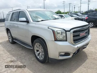 2015 GMC Yukon SLT z VIN 1GKS1BKC9FR656523, wystawiony jako IAAI lot #42104003 z przebiegiem 174 922 mil mil oraz . Historia ofert i sprzedaży dostępna na DreamBid. Obrazek 1.