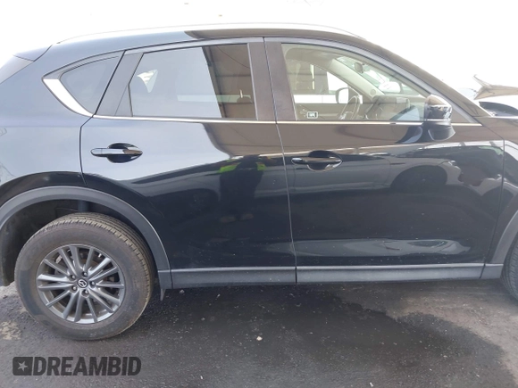 2020 Mazda CX-5 Touring with VIN JM3KFACM0L0804998, listed as a IAAI auction lot 41850998 with 44,519 mi miles. Bid and sale history available at carsss.com. Image 13.