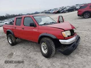 2000 Nissan Frontier XE with VIN 1N6ED27Y8YC324175, listed as a Copart auction lot 41891105 with 239,068 mi miles and Clean title. Bid and sale history available at DreamBid. Image 4.