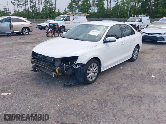 2013 Volkswagen Jetta SE z VIN 3VWDX7AJ2DM365888, wystawiony jako IAAI lot #42619730 z przebiegiem 134 594 mil mil oraz . Historia ofert i sprzedaży dostępna na DreamBid. Obrazek 2.