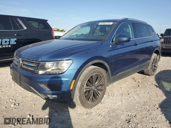 2018 Volkswagen Tiguan SEL with VIN 3VV3B7AX1JM034279, listed as a Copart auction lot 60402155 with 91,751 mi miles and Salvage title. Bid and sale history available at DreamBid. Image 1.