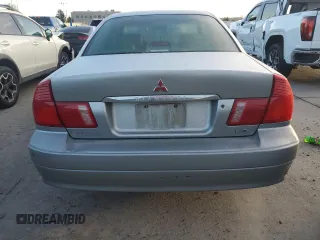 2000 Mitsubishi Diamante LS z VIN 6MMAP67P5YT006608, wystawiony jako Copart lot #49009455 z przebiegiem 241 503 mil mil oraz Tytuł czysty. Historia ofert i sprzedaży dostępna na DreamBid. Obrazek 6.