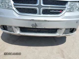2014 Dodge Journey SE with VIN 3C4PDCAB0ET284437, listed as a IAAI auction lot 42063601 with 206,913 mi miles and . Bid and sale history available at carsss.com. Image 6.