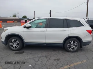 2016 Honda Pilot EX-L with VIN 5FNYF5H54GB037742, listed as a IAAI auction lot 41988112 with 68,459 mi miles and . Bid and sale history available at DreamBid. Image 14.
