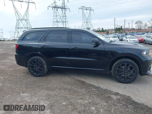 2019 Dodge Durango GT Plus with VIN 1C4RDJDG6KC561099, listed as a IAAI auction lot 41963187 with 104,153 mi miles and . Bid and sale history available at DreamBid. Image 14.