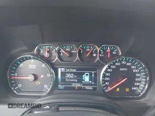 2019 Chevrolet Suburban Premier with VIN 1GNSKJKC7KR261826, listed as a IAAI auction lot 41652451 with 127,032 mi miles and . Bid and sale history available at DreamBid. Image 7.