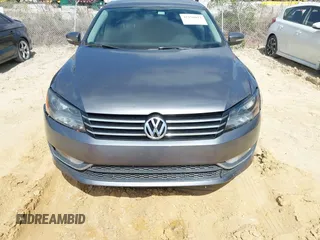2015 Volkswagen Passat S with VIN 1VWAS7A38FC082760, listed as a IAAI auction lot 42156013 with 199,450 mi miles and . Bid and sale history available at DreamBid. Image 6.