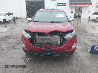 2018 Chevrolet Equinox Premier with VIN 2GNAXVEVXJ6115268, listed as a IAAI auction lot 40881577 with 61,910 mi miles and . Bid and sale history available at DreamBid. Image 6.