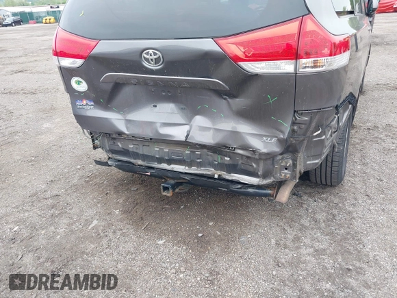 2014 Toyota Sienna XLE with VIN 5TDYK3DC0ES436502, listed as a IAAI auction lot 42180990 with 154,839 mi miles and . Bid and sale history available at DreamBid. Image 19.
