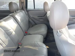 2002 Jeep Grand Cherokee with VIN 1J4GW38N42C202219, listed as a IAAI auction lot 42035162 with 220,012 mi miles and . Bid and sale history available at DreamBid. Image 8.