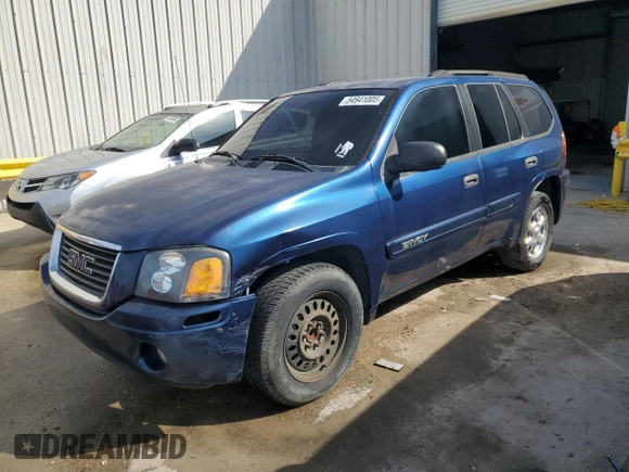 2004 GMC Envoy SLE with VIN 1GKDS13S842402250, listed as a Copart auction lot 54941005 with 163,380 mi miles and Salvage Title. Bid and sale history available at DreamBid. Image 1.