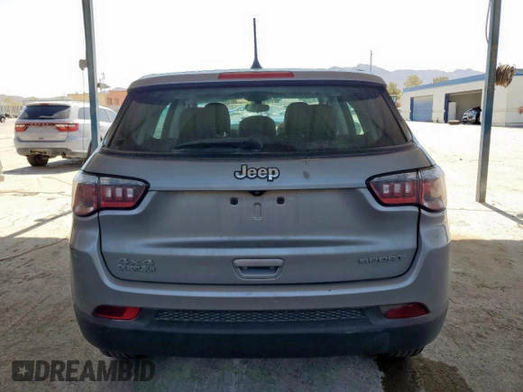 2020 Jeep Compass Sport z VIN 3C4NJDAB4LT174073, wystawiony jako Copart lot #61958075 z przebiegiem 105 000 mil mil oraz Szkoda całkowita • Salvage title. Historia ofert i sprzedaży dostępna na DreamBid. Obrazek 6.