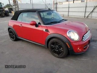 2015 MINI Convertible with VIN WMWZN3C59FT862963, listed as a Copart auction lot 86016514 with 96,493 mi miles and Salvage title. Bid and sale history available at DreamBid. Image 4.