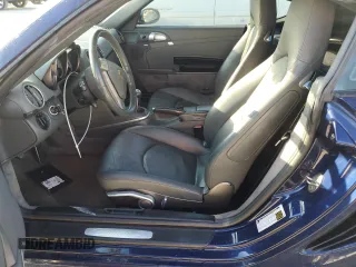 2006 Porsche Cayman S с VIN WP0AB298X6U784188, выставлен на аукционе Copart как лот 77872504 с пробегом Не указан миль и Списание • Salvage title. История ставок и продаж доступна на DreamBid. Изображение 7.