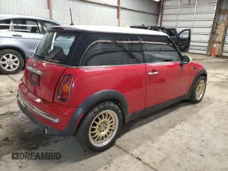 2002 MINI Hardtop with VIN WMWRC33452TC35333, listed as a Copart auction lot 44447425 with 166,353 mi miles and Salvage Title. Bid and sale history available at DreamBid. Image 3.