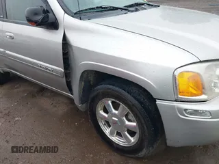 2004 GMC Envoy SLT z VIN 1GKDT13S742130352, wystawiony jako IAAI lot #42355072 z przebiegiem 170 355 mil mil oraz . Historia ofert i sprzedaży dostępna na DreamBid. Obrazek 16.