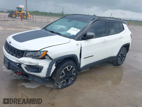 2020 Jeep Compass Trailhawk with VIN 3C4NJDDB3LT118928, listed as a IAAI auction lot 42128120 with 95,477 mi miles and . Bid and sale history available at DreamBid. Image 17.