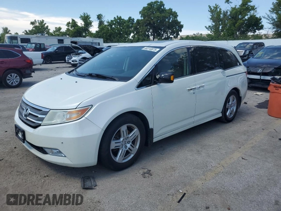 2013 Honda Odyssey Touring with VIN 5FNRL5H99DB052538, listed as a Copart auction lot 66310875 with 192,052 mi miles and Clean title. Bid and sale history available at DreamBid. Image 1.