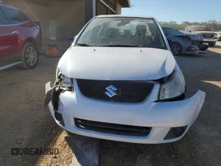 2013 Suzuki SX4 LE with VIN JS2YC5A30D6101502, listed as a Copart auction lot 77066564 with 96,626 mi miles and Salvage Title. Bid and sale history available at carsss.com. Image 5.