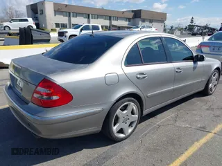 2003 Mercedes-Benz E-Class 3.2L with VIN WDBUF65J63X103423, listed as a IAAI auction lot 41937358 with 151,439 mi miles. Bid and sale history available at carsss.com. Image 4.