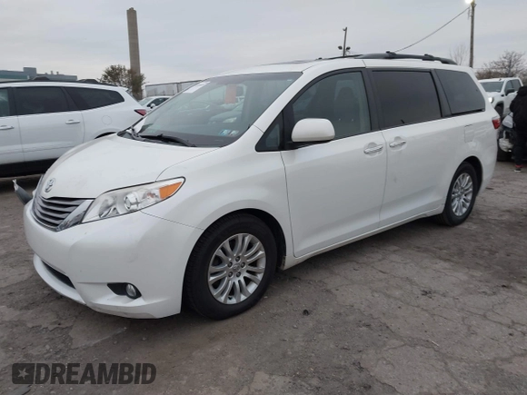 2015 Toyota Sienna XLE with VIN 5TDYK3DC9FS595827, listed as a IAAI auction lot 41014820 with 119,143 mi miles. Bid and sale history available at carsss.com. Image 17.