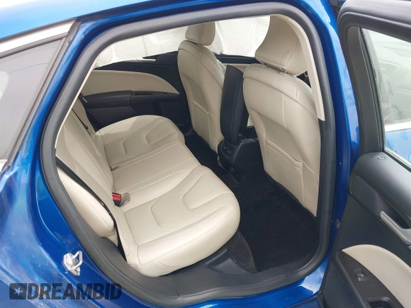 2017 Ford Fusion Hybrid Titanium с VIN 3FA6P0RU5HR388615, выставлен на аукционе IAAI как лот 42066142 с пробегом 121 618 миль миль и . История ставок и продаж доступна на DreamBid. Изображение 8.