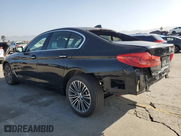2018 BMW 5 Series 530i with VIN WBAJA5C52JWA36440, listed as a Copart auction lot 63325515 with 8,786 mi miles and Salvage title. Bid and sale history available at DreamBid. Image 2.