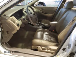 2002 Honda Accord EX z VIN 1HGCG165X2A008669, wystawiony jako Copart lot #41432445 z przebiegiem 260 397 mil mil oraz Czysty tytuł • Clean title. Historia ofert i sprzedaży dostępna na DreamBid. Obrazek 7.