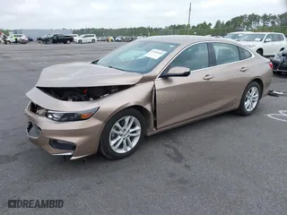 2018 Chevrolet Malibu LT with VIN 1G1ZD5ST3JF211359, listed as a IAAI auction lot 41964040 with 104,037 mi miles. Bid and sale history available at carsss.com. Image 2.